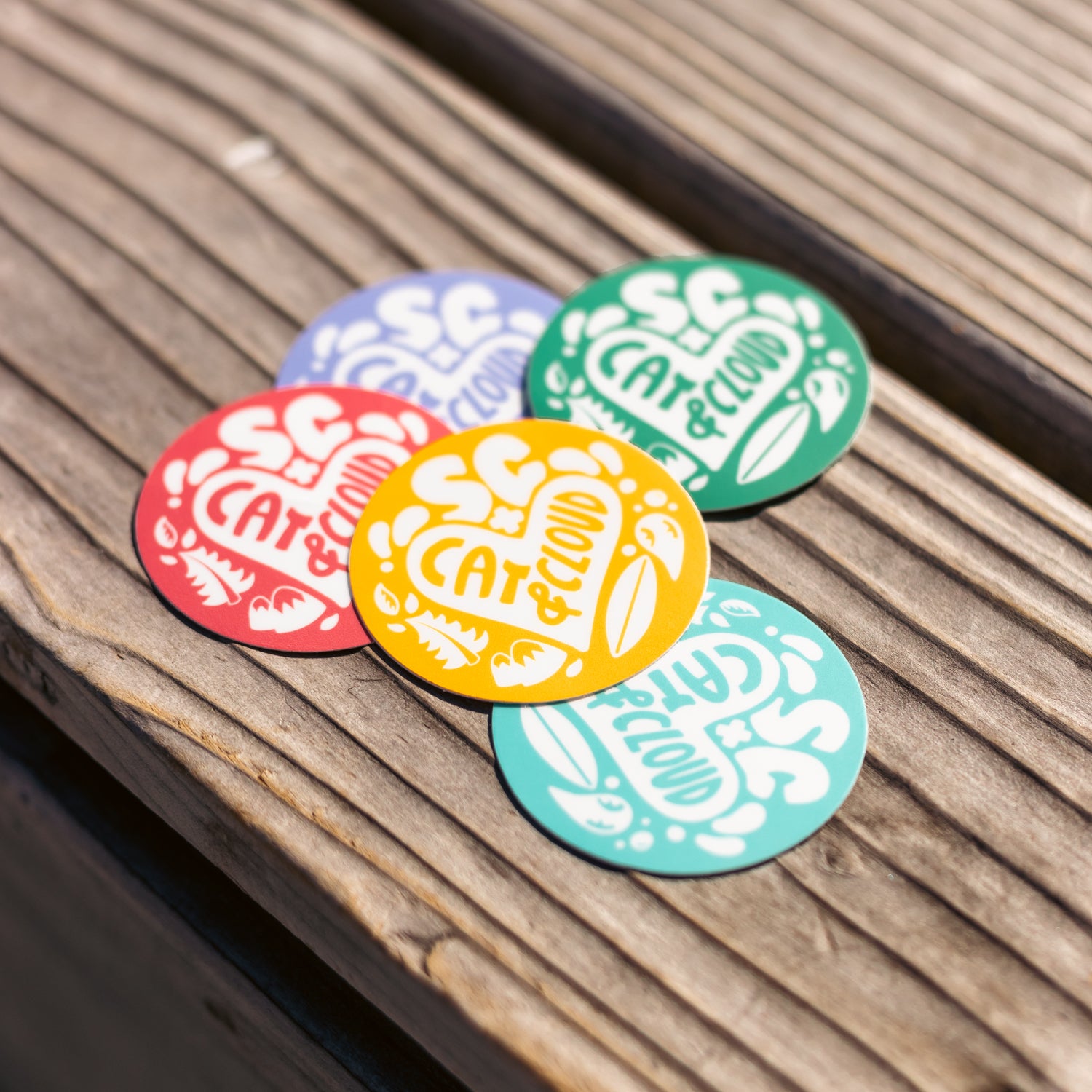 Cat & Cloud round sticker in five different colorways